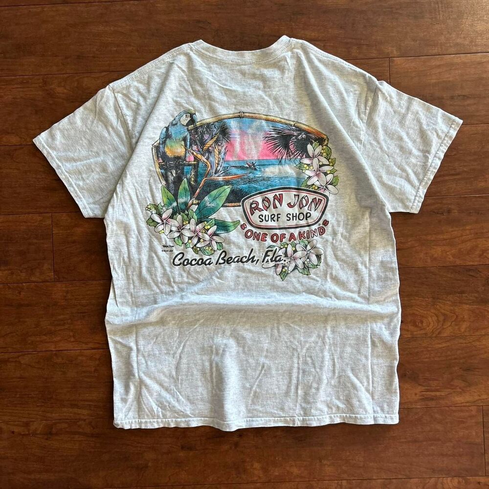 90s Ron Jon Surf Shop white pocket tee with irl surf graphic